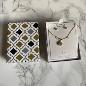 Sensitive Ear Cubic zirconia earrings and matching pendant necklace.